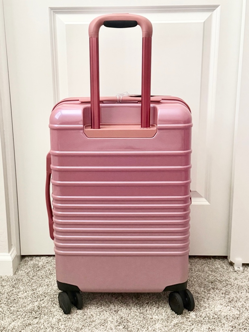 The Carry-on Luggage in Wicked Pink - Picture 2 of 4